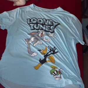 This a Looney Tunes shirt and the front and back of it.